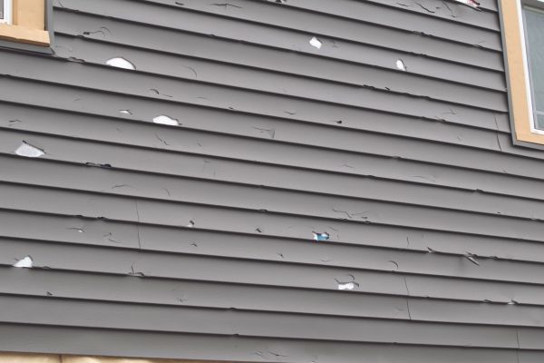 Damaged Siding Replacement in Huntsville